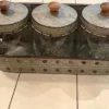Three Glass Canisters with Metal Storage Bin